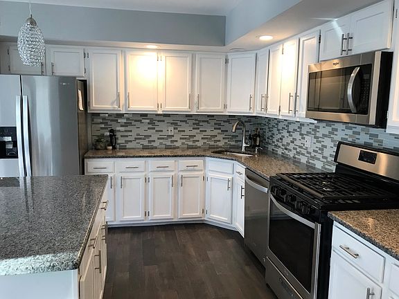 New granite and SS appliance