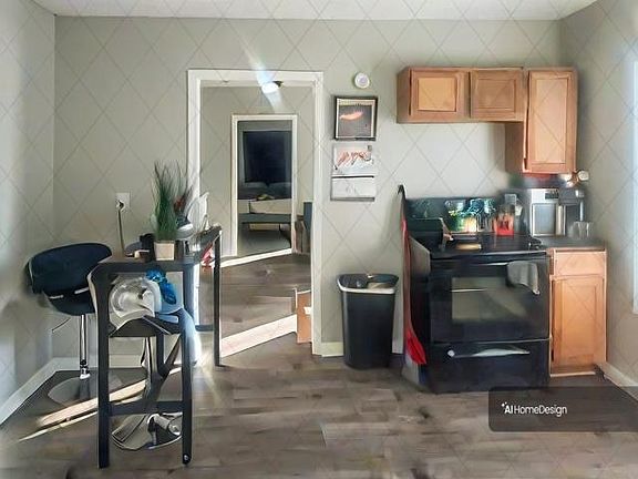 Kitchen w/plenty of natural light! Photo is of current tenants decor. Will be updated!!