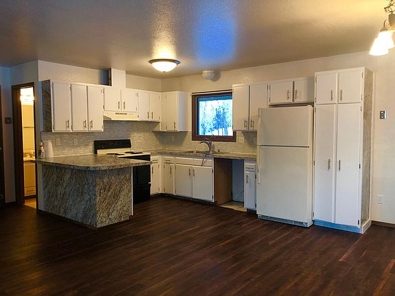Photo taken prior to dishwasher installation.