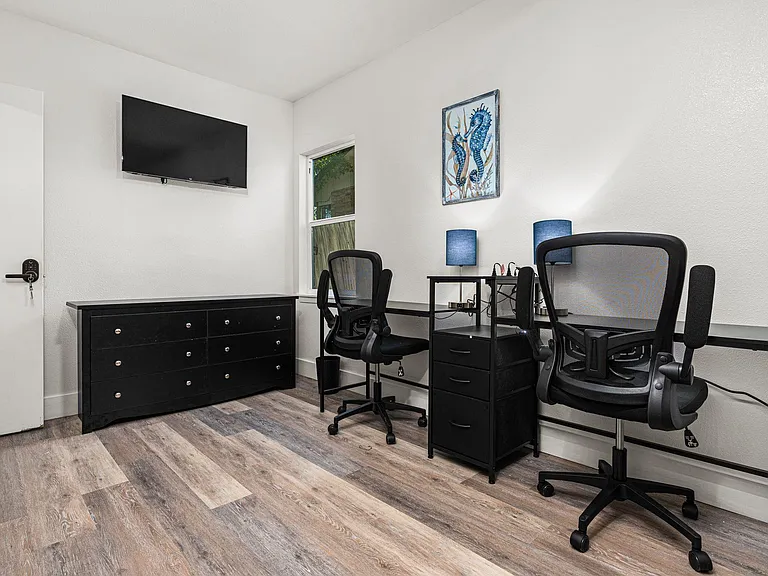Large dresser, double desks and TV!