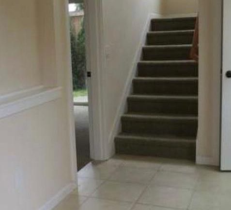 entrance left white door is the first master bedroom with full bathroom and second master Bedroom is upstairs.