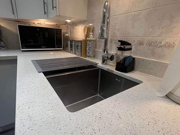 Lovely and Spacious Kitchen with modern quartz counter top