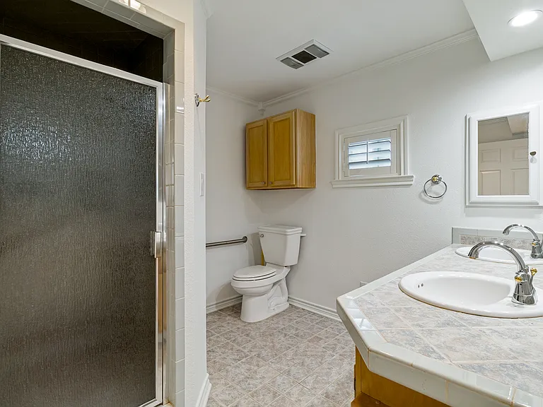 Primary Bathroom includes two sinks and a walk-in shower.