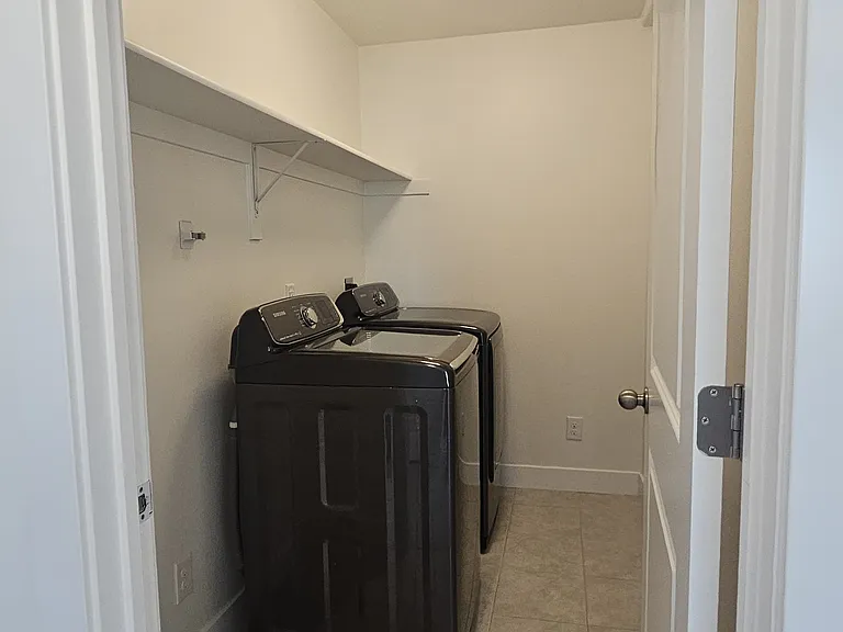 Laundry room with washer and dryer