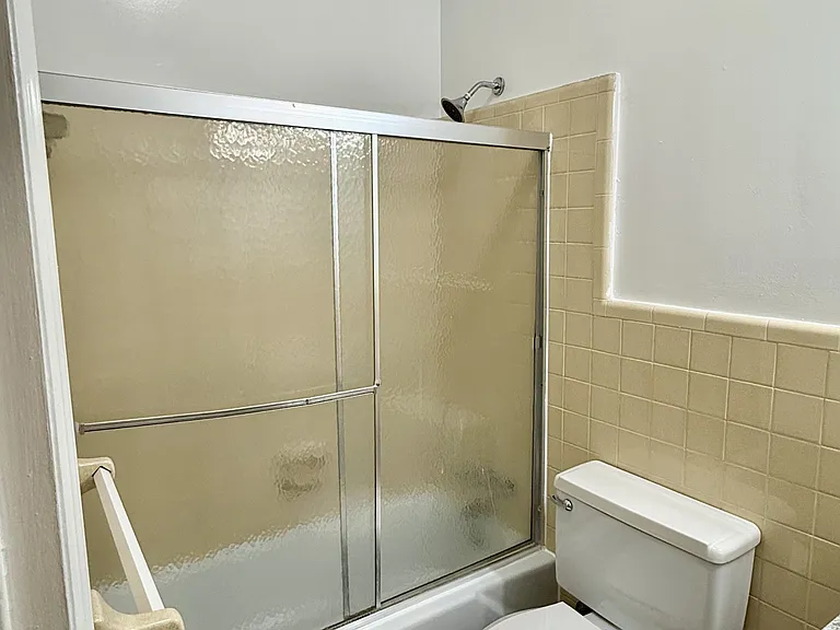 Bathroom. Vanity and linen not included in picture