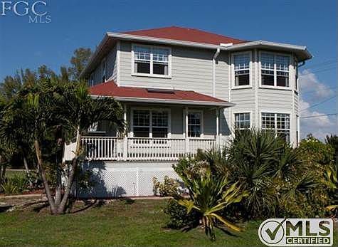 This spacious home is located in a quiet neighborhood in St james City.