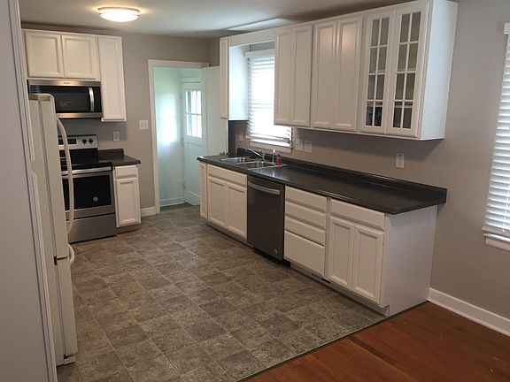 New Kitchen, with new Whrilpool stainless range, dishwasher, and microwave.