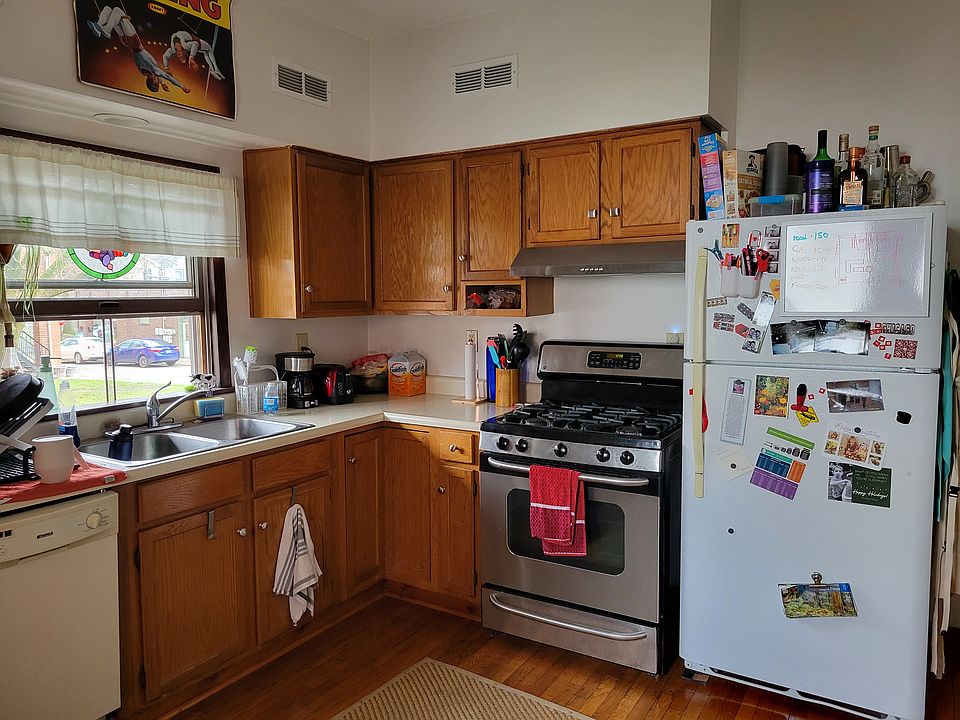 gas stove with under-cabinet vent, dishwasher, full size refrigerator, double stainless steel sink, disposal, hardwood floor.
the main entry is to the kitchenapprox 14 x 14 ft