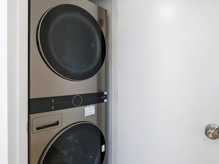 in-unit brand new LG stacked washer dryer.