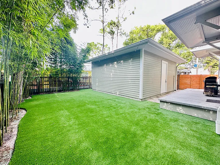 Brand new Astroturf through backyard