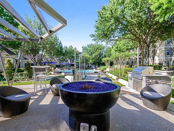 Outdoor Entertaining Space with Cozy Fireside Feature.