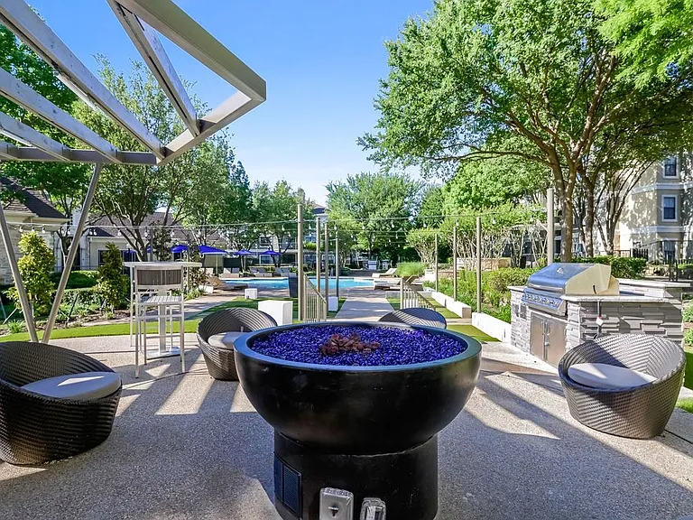 Outdoor Entertaining Space with Cozy Fireside Feature.