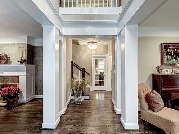 Hardwood flrs, rich trim, plantation shutters/window treatments