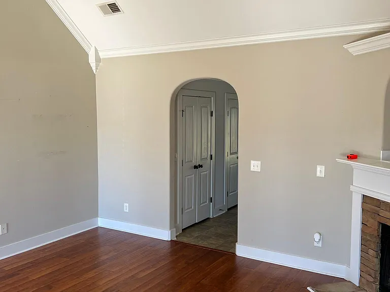 Living room towards kitchen.