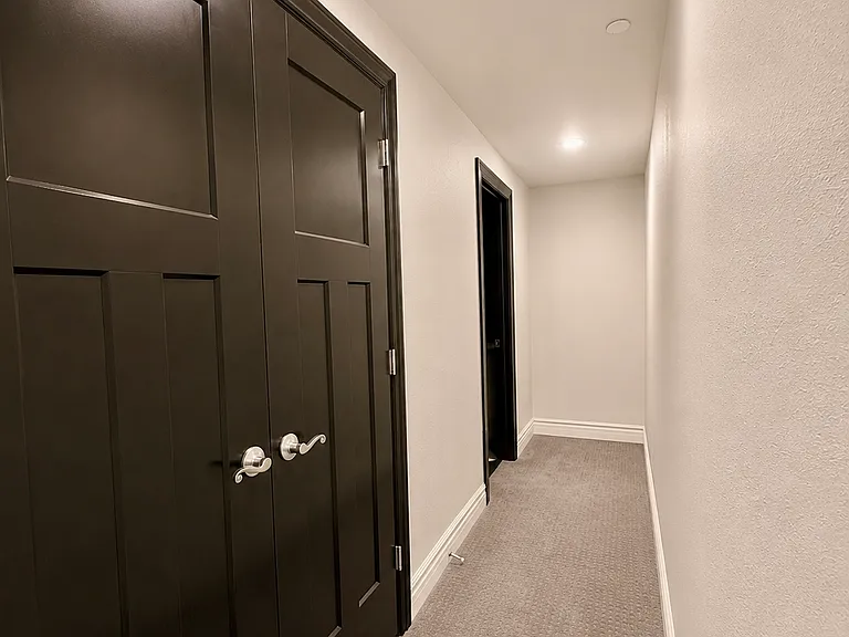 hallway with large storage closet