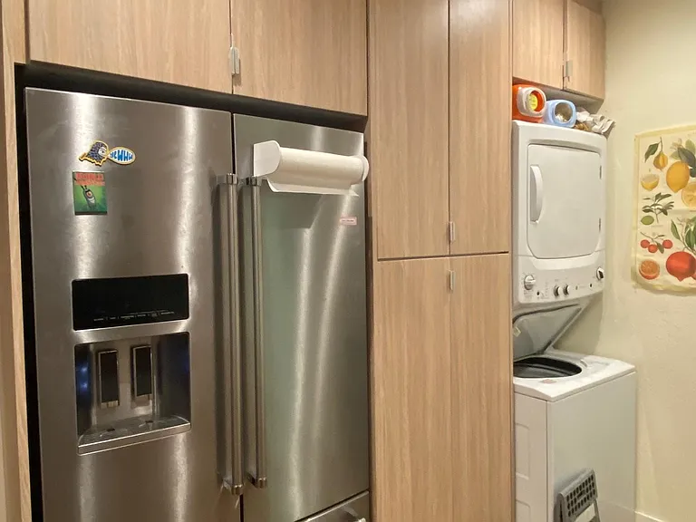 Kitchen with washer and dryer