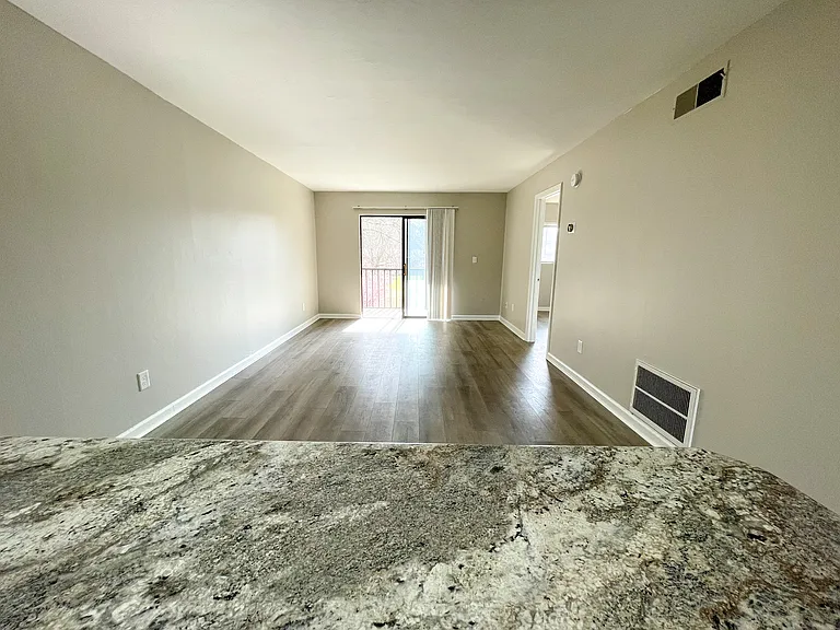Open concept living room adjacent to the kitchen.