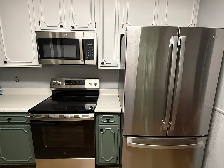 Kitchen: new stove, microwave, and fridge