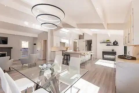 Dining room opens to kitchen/living areas