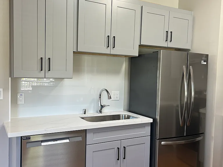 Full size dishwasher and new refrigerator