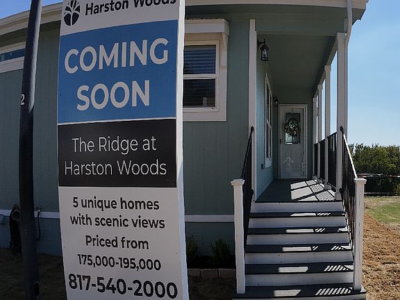 The front of a beautiful small cottage with scenic view