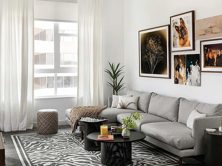 Apartment Living Room with Hard Wood Flooring.