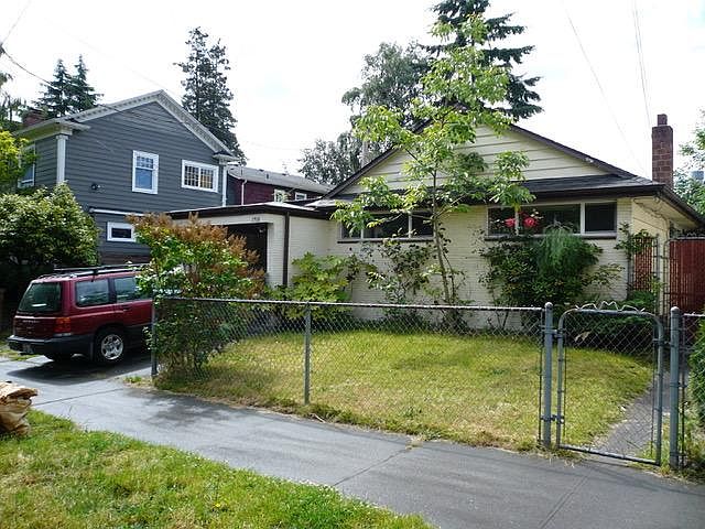 Roy St. view fenced front yard