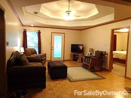 Living room with custom ceiling
						:
						Living room with parquet wood floors. Room size 14 x 18.5.