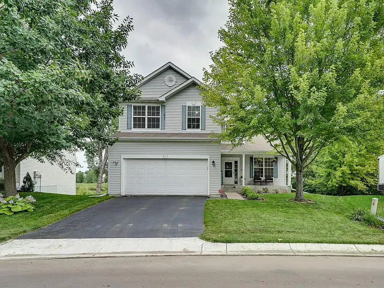 Front of house with 2 car garage