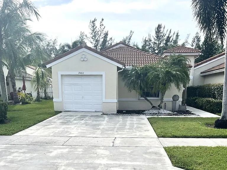 7063 Burgess Dr — Photo 1
