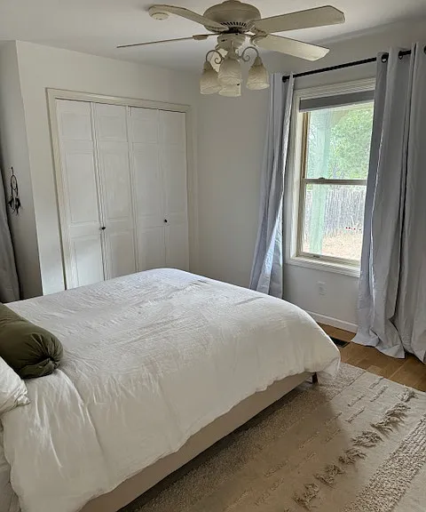 Back Guest Bedroom with Queen Sized Bed with Stearns and Foster Mattress