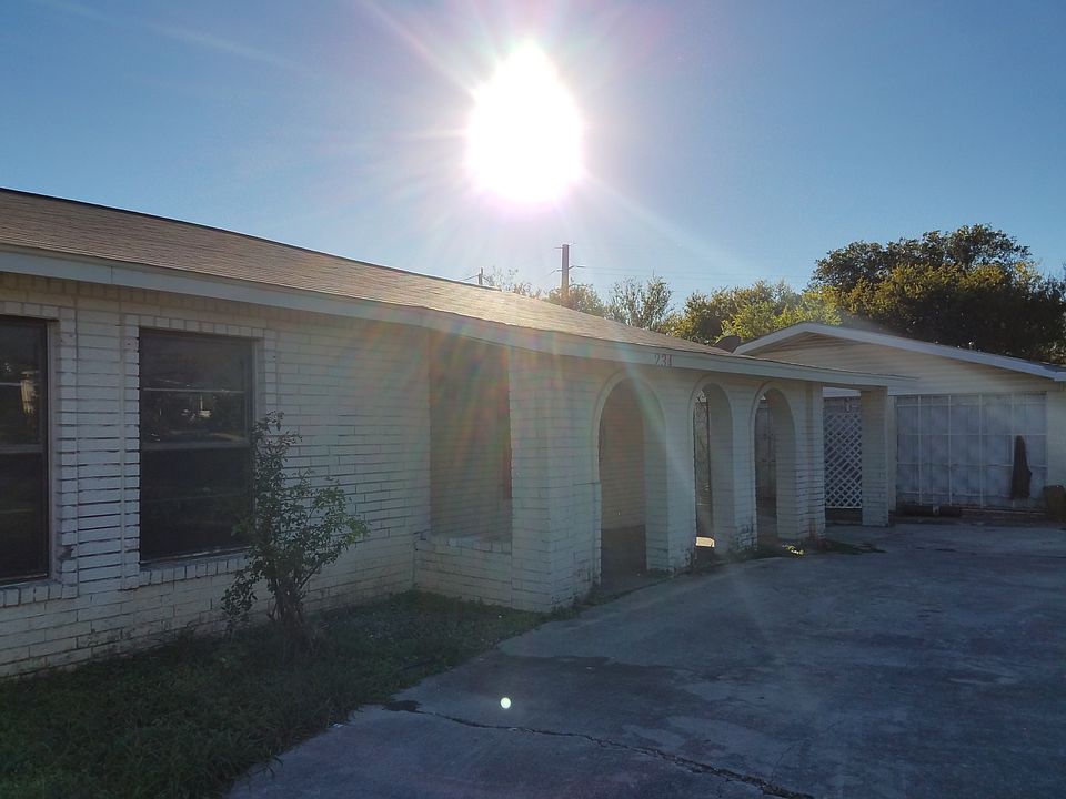 Front with circular drive & patio