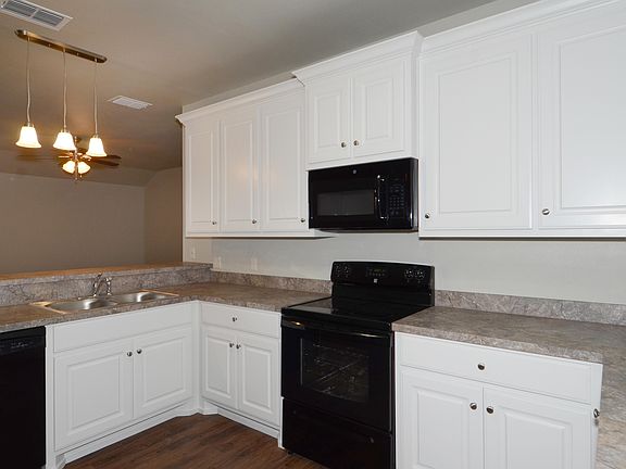 5th image of 9803 Avenue W Unit A