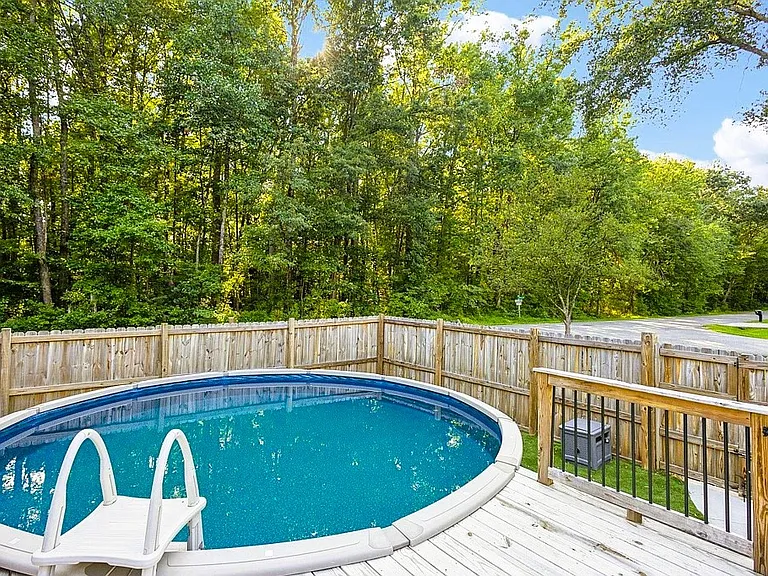 18 ft above-ground pool with a deck