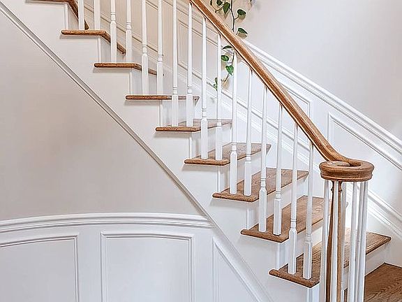 Foyer with curved staircase