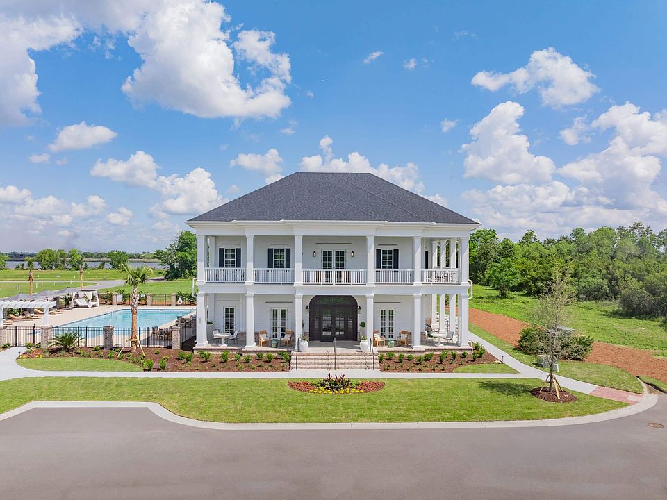 A Lowcountry-inspired clubhouse with porches, pool views, and timeless Southern charm.