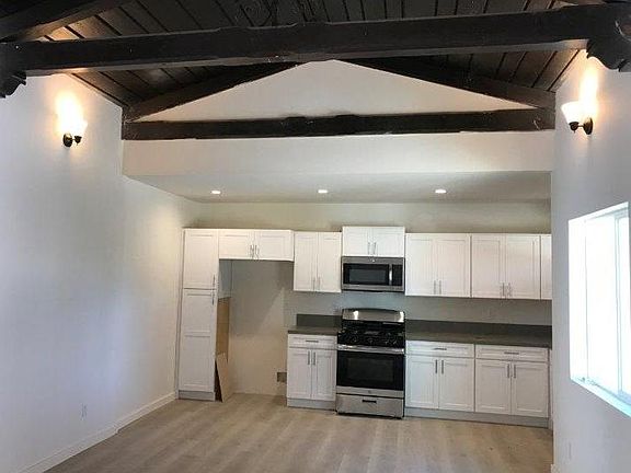 Open Truss Ceiling Modern Kitchen