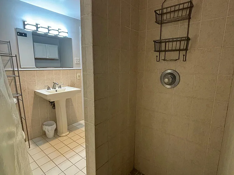 Shower is 6 feet long and 3 feet wide