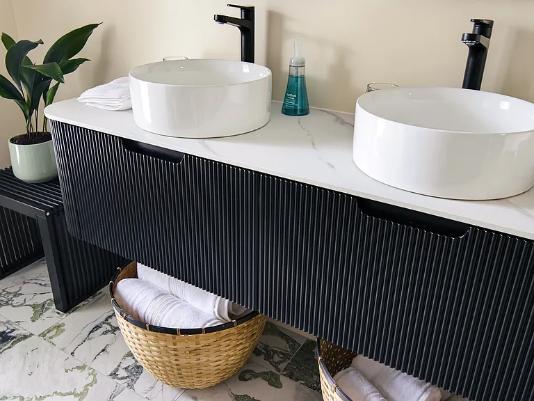 Brand-new primary bathroom with floating sinks (Pic 7)