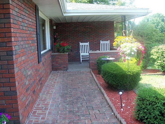 Brick walk-way leading to porch
