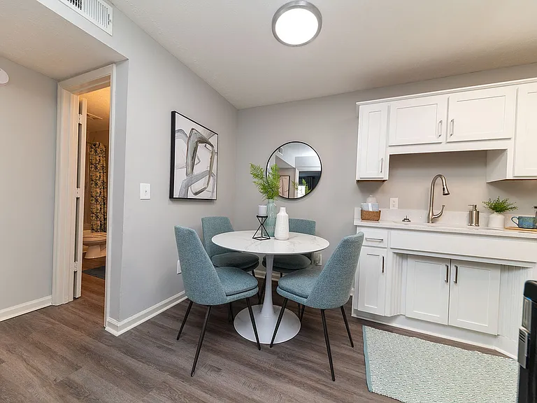 Dining area with hardwood-style flooring