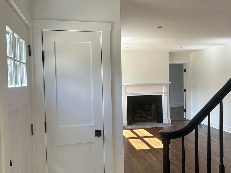 Front entrance with guest closet, with adjacent access to living room.