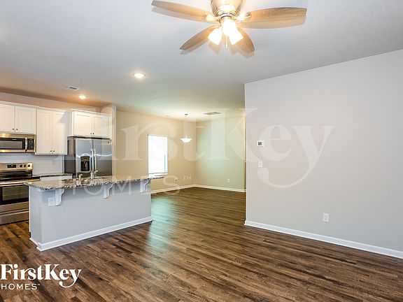5th image of 10724 Rivergate Dr NW