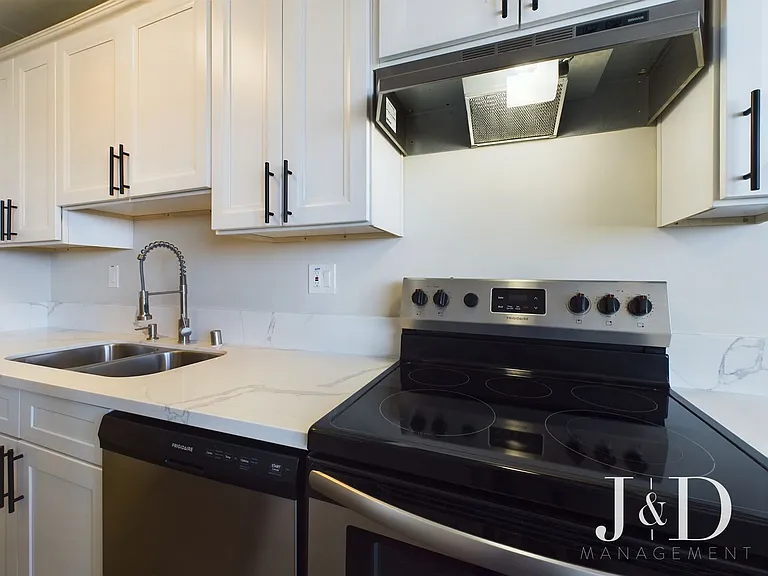 Newly Renovated Units Near the Beach with Parking — Photo 17
