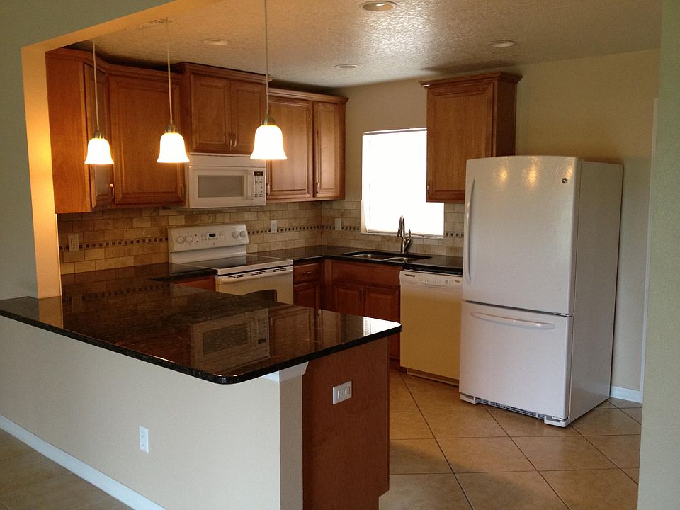 Maple cabinetry and granite tops