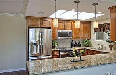 Open kitchen allows ease when entertaining friends and family.