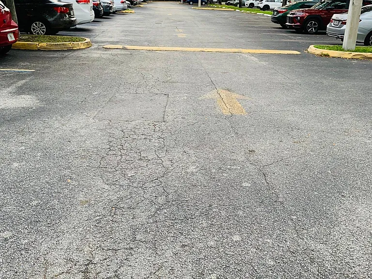Condominium, Gated Parking Lot.