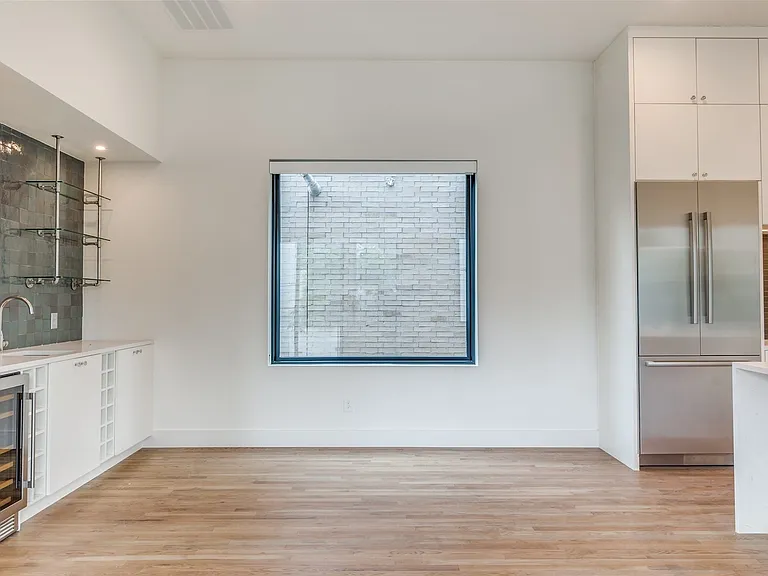 Spacious dining room is open to the kitchen area lending the space well to entertaining.