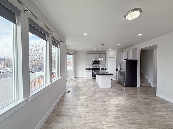 Large open living space, tonne of natural light - blinds for all windows.