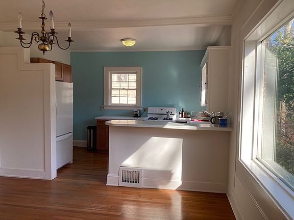 Getting new/modern dining room light fixture :) -- Kitchen and bath will be painted Greek Villa white